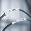 imageDYMO Rhino Industrial HeatShrink Labels 34quot Tube Black Print on WhiteBlack on White
